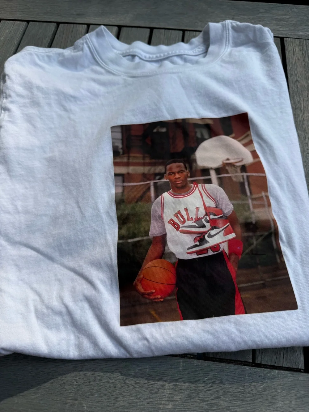 Jordan White Graphic Basketball Tee with Red & Black Accents